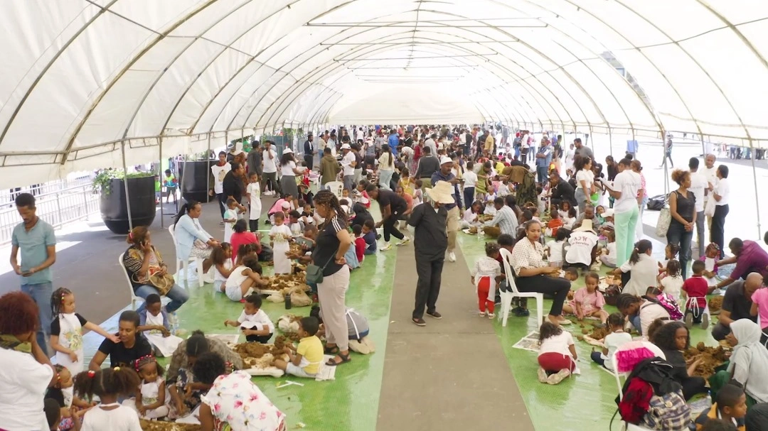 Ethiopian families celebrating at a Nu Chika Enabuka festival